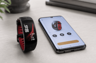 Samsung Gear Fit 2 Pro рядом со смартфоном с приложением для подключения